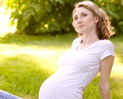 happy-pregnant-woman-outside-shutterstock