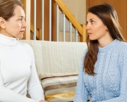 mother with  teen daughter having serious talking