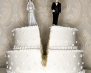 Wedding cake visual metaphor with figurine cake toppers   Original Filename: 72472453.jpg