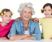 Senior woman and kids with hair curlers
