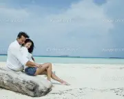 Couple romancing on the beach