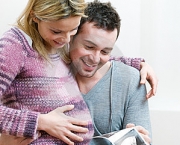 happy-pregnant-young-couple-baby-sonogram-12726558